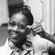 Cicely Tyson peers through a monocle at the Dorchester Hotel in London, Feb. 19, 1973.